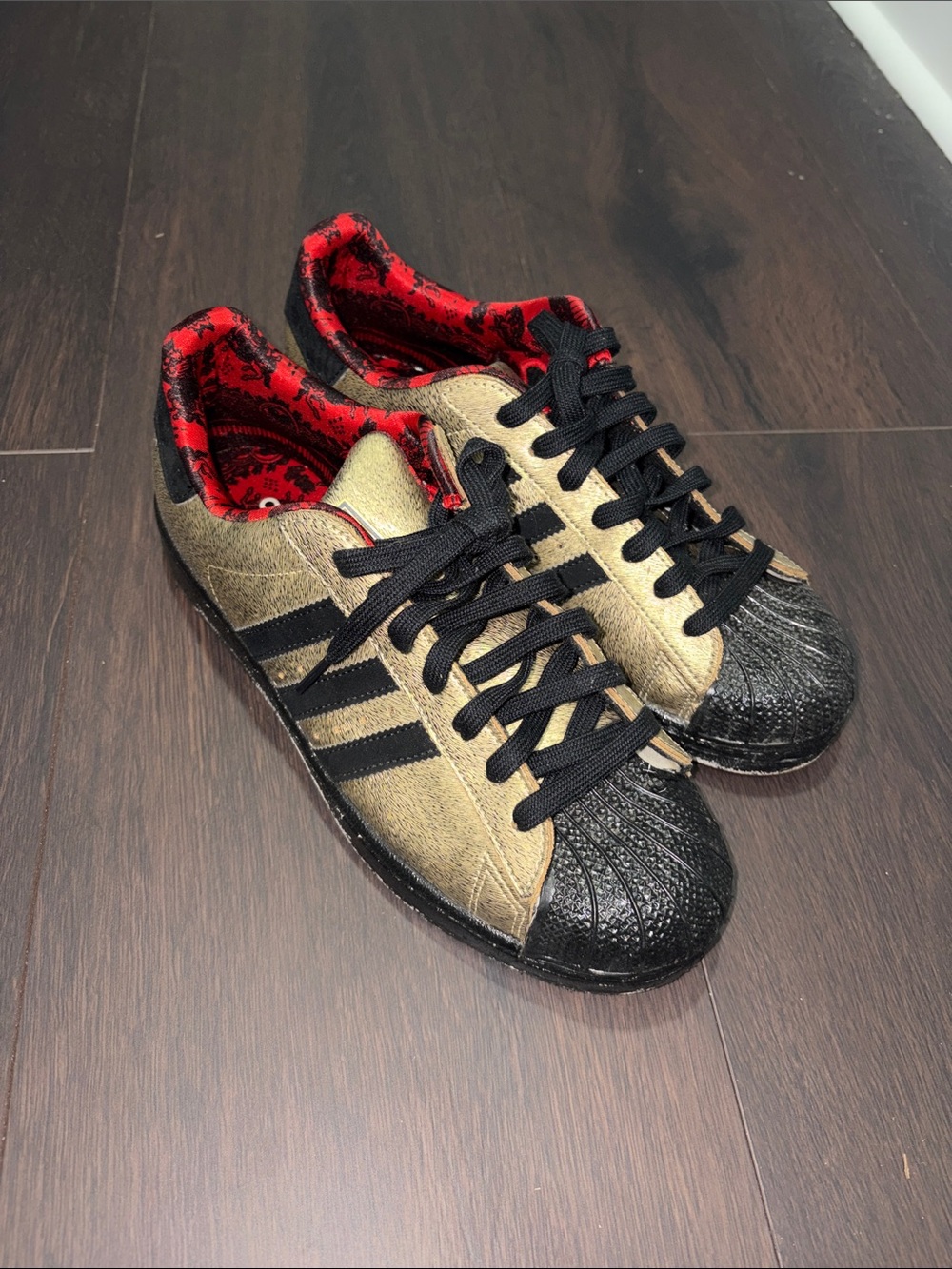 adidas Metallic Gold & Black Shell Toe Sneakers with Red Lining